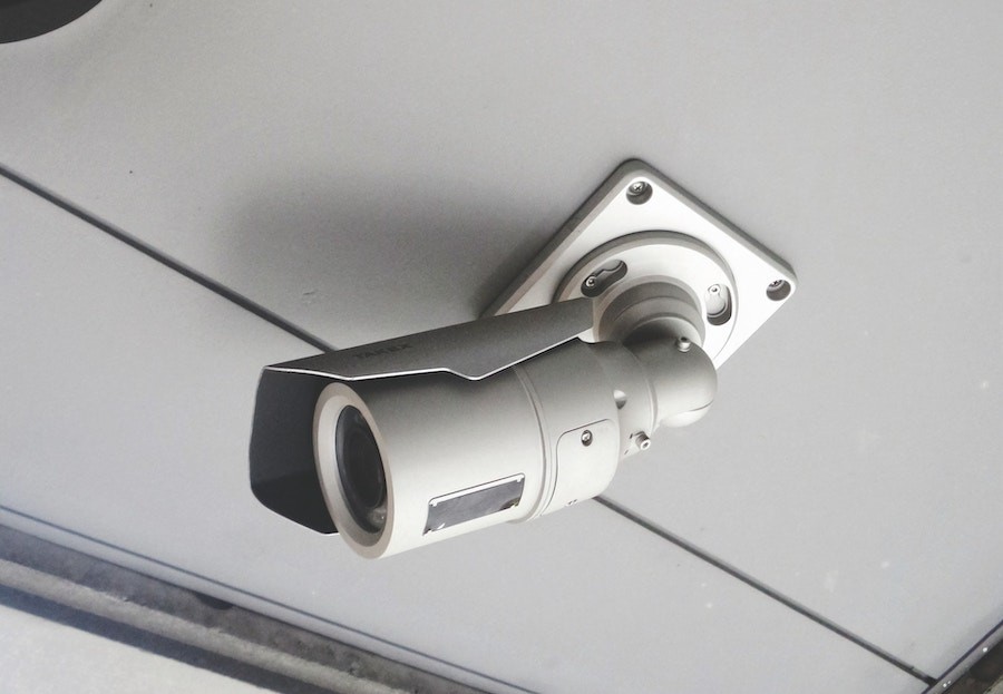 A picture of a CCTV camera mounted on a ceiling in a Kansas City facility.